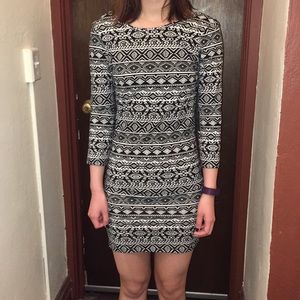 Black and white stretchy long sleeve mini dress.